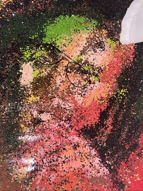 Colorful Sequin Portrait with Wire-Frame Glasses que PM dit.
